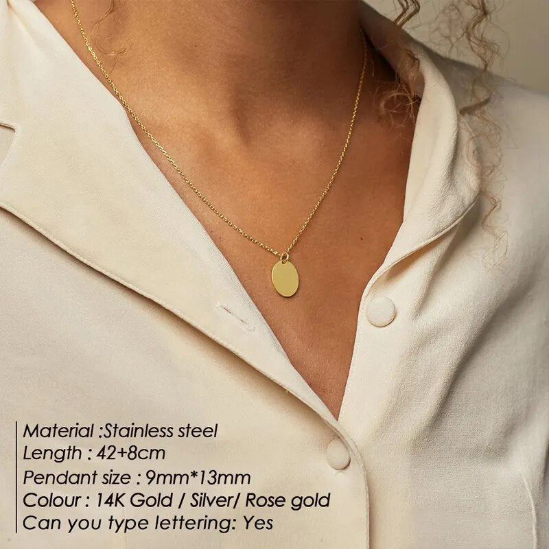 Women Jewelry: Oval Gold-Toned Stainless Pendant Necklace